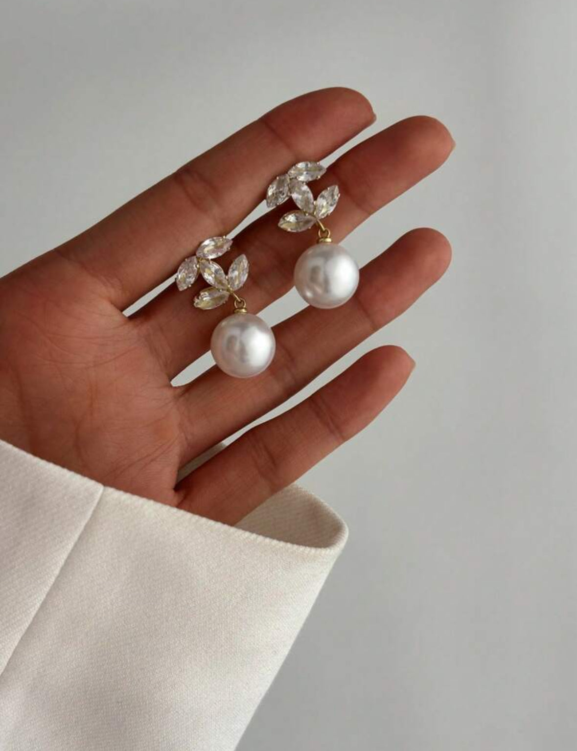 Brincos com pérolas